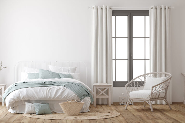 Light farmhouse bedroom interior with blank wall